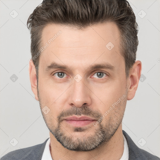 Neutral white adult male with short  brown hair and brown eyes