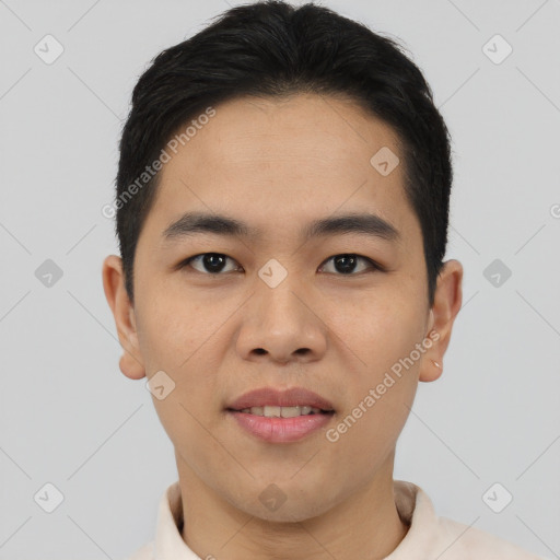 Joyful asian young-adult male with short  brown hair and brown eyes