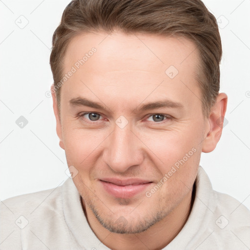 Joyful white young-adult male with short  brown hair and brown eyes