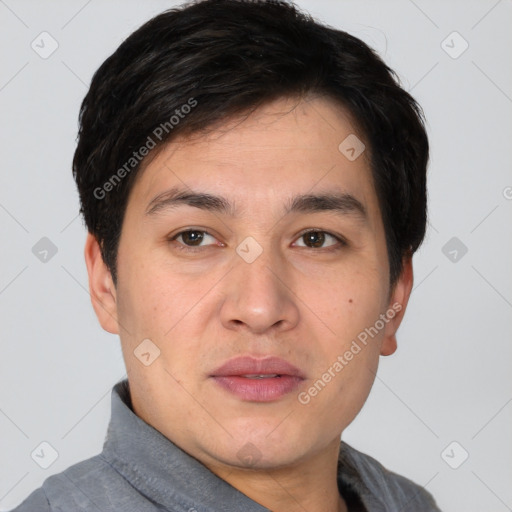 Joyful white young-adult male with short  black hair and brown eyes