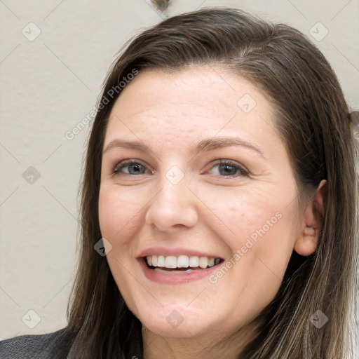 Joyful white young-adult female with long  brown hair and grey eyes