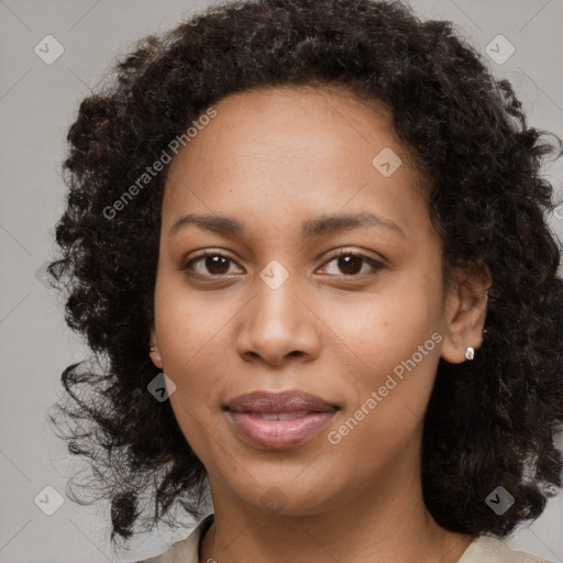 Joyful black young-adult female with medium  brown hair and brown eyes