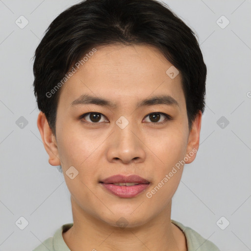 Joyful asian young-adult male with short  brown hair and brown eyes