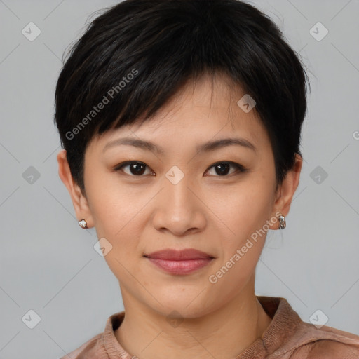 Joyful asian young-adult female with short  brown hair and brown eyes