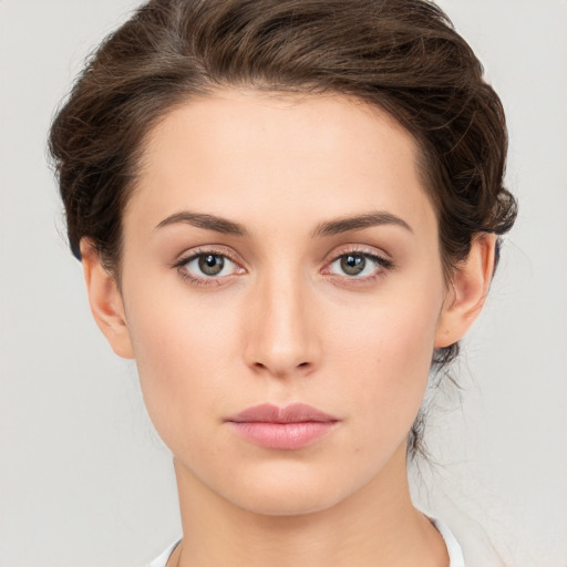 Neutral white young-adult female with medium  brown hair and brown eyes