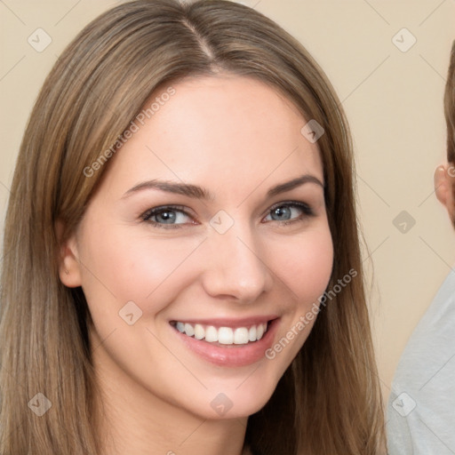 Joyful white young-adult female with long  brown hair and brown eyes