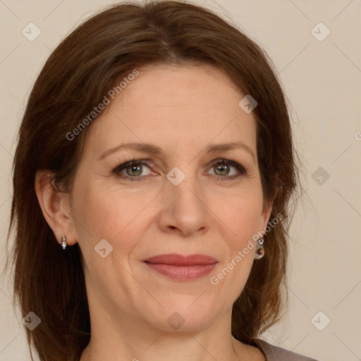 Joyful white adult female with medium  brown hair and brown eyes