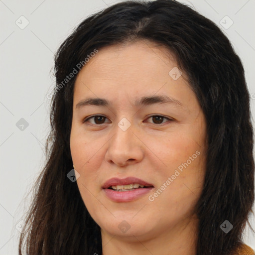 Joyful white adult female with long  brown hair and brown eyes