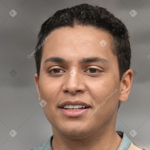 Joyful white young-adult male with short  black hair and brown eyes