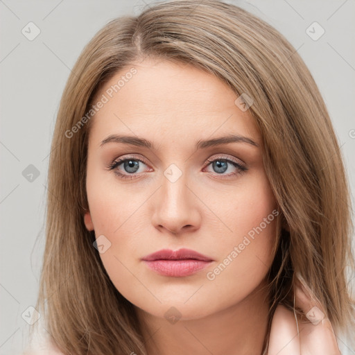 Neutral white young-adult female with long  brown hair and brown eyes