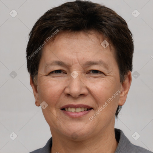 Joyful white adult female with short  brown hair and brown eyes