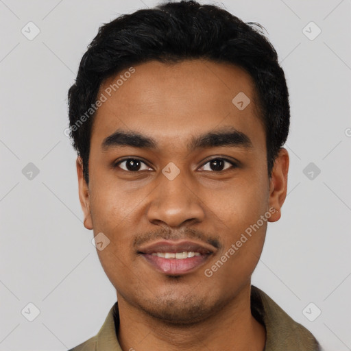 Joyful latino young-adult male with short  black hair and brown eyes
