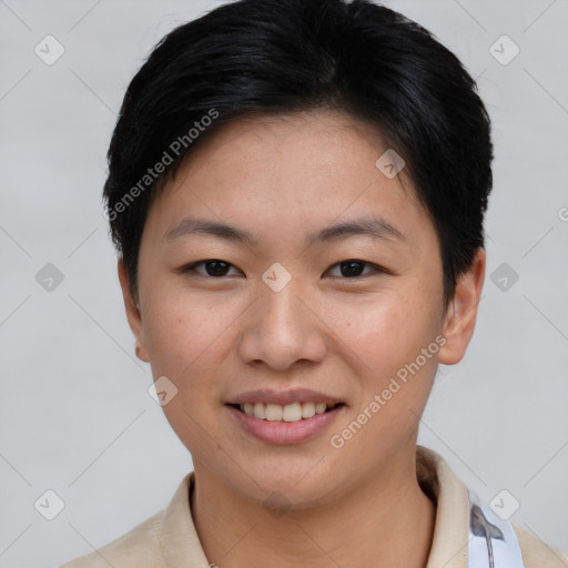 Joyful asian young-adult female with short  brown hair and brown eyes