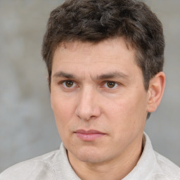 Neutral white adult male with short  brown hair and brown eyes