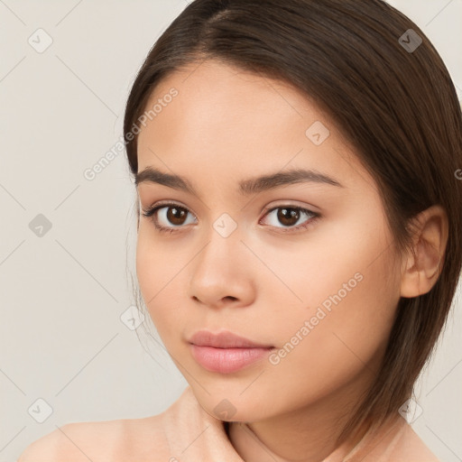 Neutral white young-adult female with long  brown hair and brown eyes