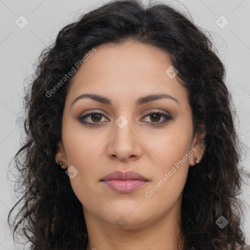 Joyful latino young-adult female with long  brown hair and brown eyes