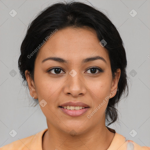 Joyful latino young-adult female with medium  brown hair and brown eyes