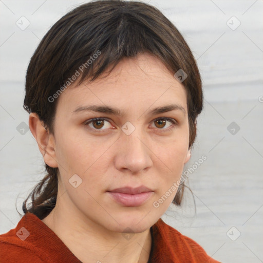 Neutral white young-adult female with short  brown hair and brown eyes