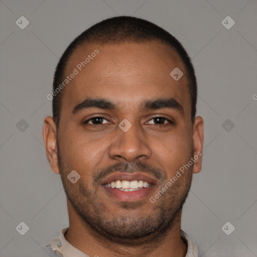 Joyful black young-adult male with short  brown hair and brown eyes