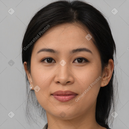 Joyful asian young-adult female with medium  brown hair and brown eyes