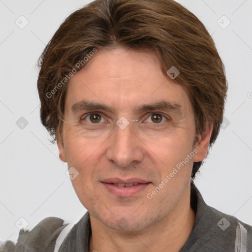 Joyful white adult male with short  brown hair and grey eyes