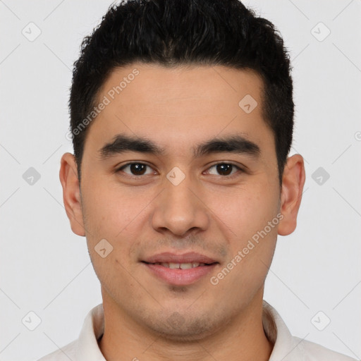 Joyful latino young-adult male with short  black hair and brown eyes