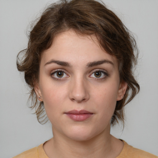 Neutral white young-adult female with medium  brown hair and brown eyes