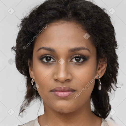 Joyful black young-adult female with long  brown hair and brown eyes