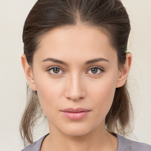 Neutral white young-adult female with medium  brown hair and brown eyes