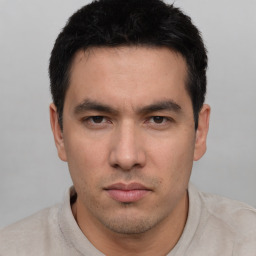 Neutral white young-adult male with short  black hair and brown eyes