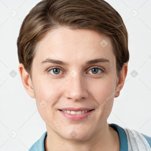 Joyful white young-adult female with short  brown hair and grey eyes