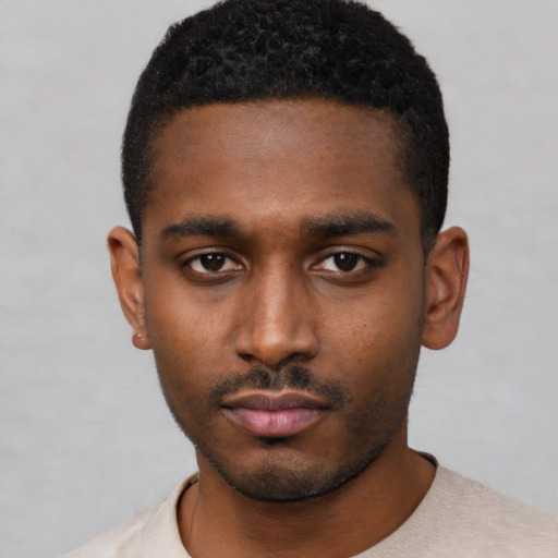 Neutral black young-adult male with short  black hair and brown eyes