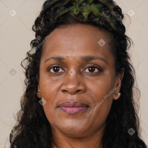Joyful white adult female with long  brown hair and brown eyes