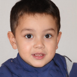 Joyful white child male with short  brown hair and brown eyes