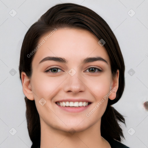 Joyful white young-adult female with medium  brown hair and brown eyes