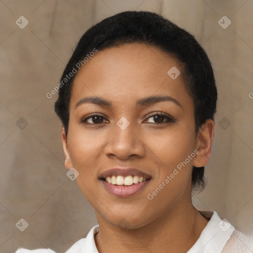 Joyful latino young-adult female with short  black hair and brown eyes