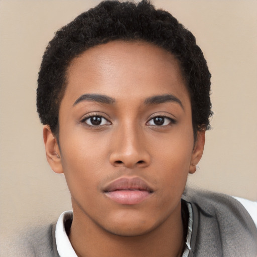 Neutral black young-adult female with short  black hair and brown eyes