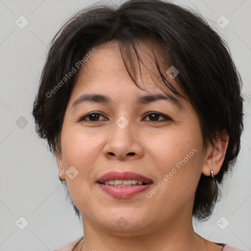 Joyful white adult female with medium  brown hair and brown eyes