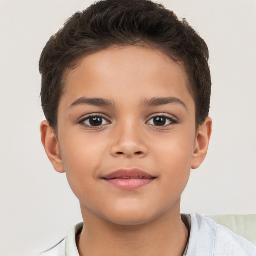 Joyful white child female with short  brown hair and brown eyes