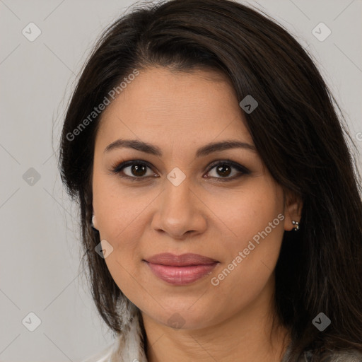 Joyful latino young-adult female with long  brown hair and brown eyes