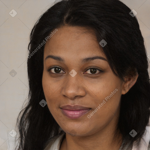 Joyful black young-adult female with long  brown hair and brown eyes