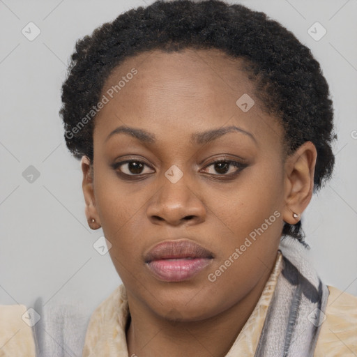 Neutral black young-adult female with short  brown hair and brown eyes