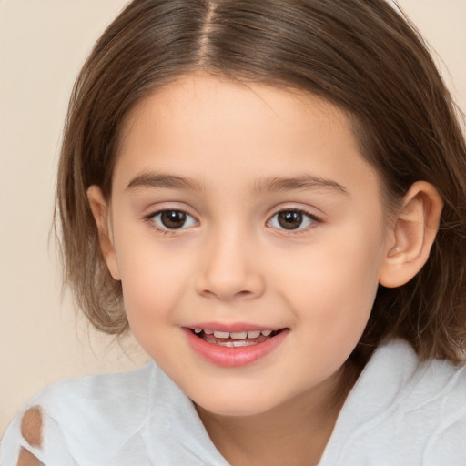 Joyful white child female with medium  brown hair and brown eyes