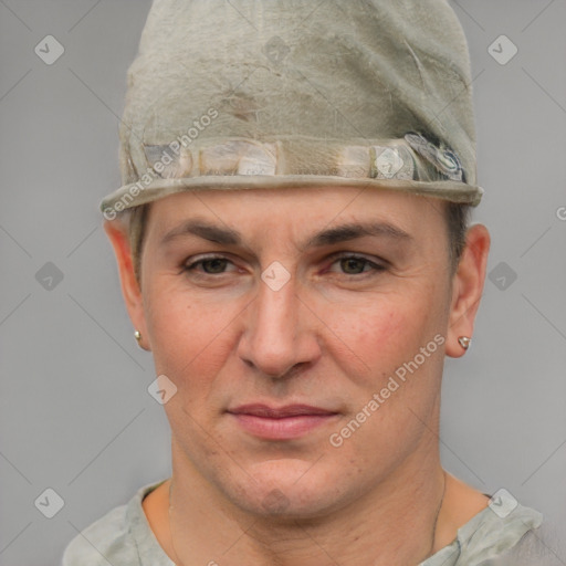 Joyful white adult female with short  brown hair and grey eyes