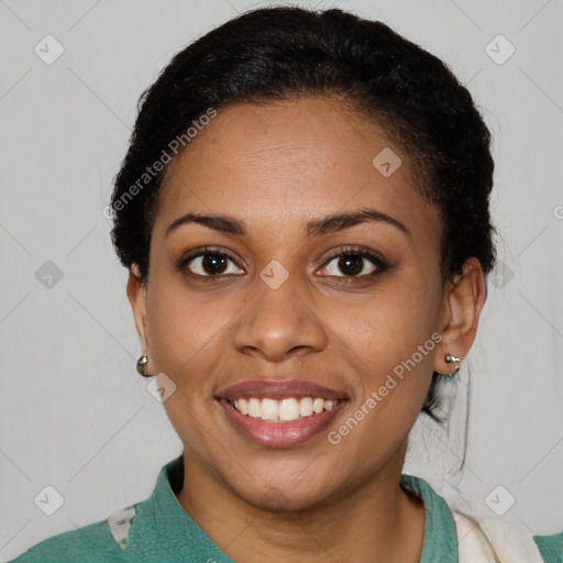 Joyful latino young-adult female with short  brown hair and brown eyes