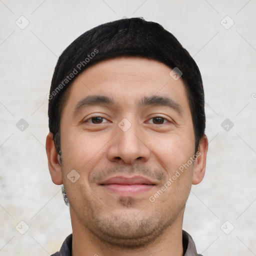 Joyful white young-adult male with short  black hair and brown eyes