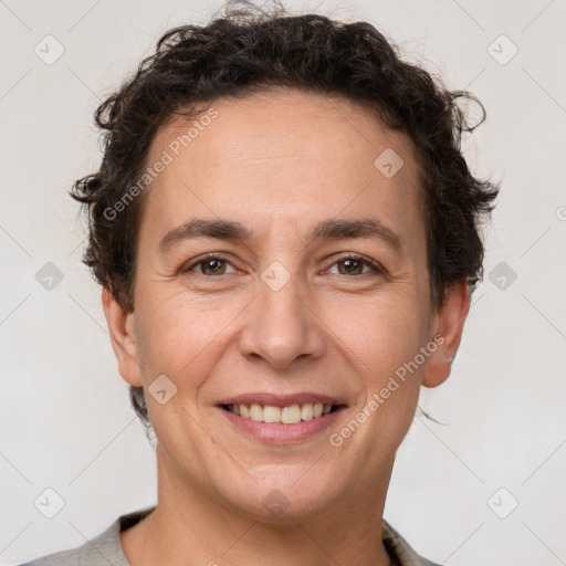 Joyful white adult female with short  brown hair and brown eyes