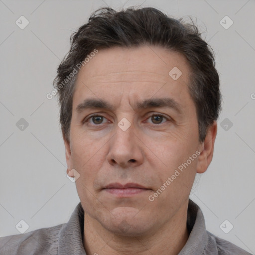 Neutral white adult male with short  brown hair and brown eyes