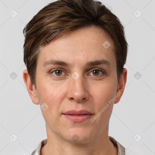 Joyful white young-adult female with short  brown hair and grey eyes