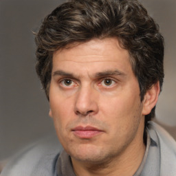 Neutral white adult male with short  brown hair and brown eyes